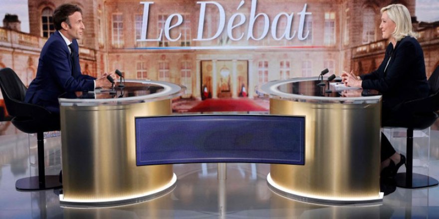 Macron'dan Le Pen'e: Başörtüsü yasağı iç savaş çıkarır