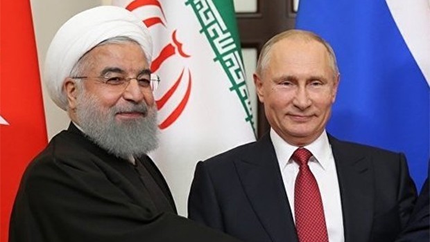Ruhani: Şam'ın onayı olmadan yabancı güçlerin Suriye'de varlığına karşıyız!