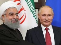 Ruhani: Şam'ın onayı olmadan yabancı güçlerin Suriye'de varlığına karşıyız!