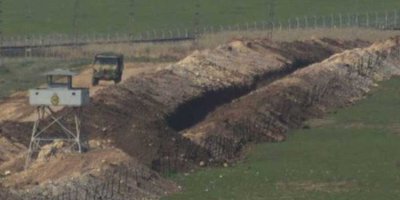 Kobani'den Türkiye sınırını geçmeye çalışan bir çocuk öldürüldü