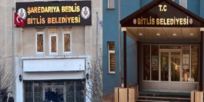 Kayyımın indirmediği tabelayı yeni belediye başkanı indirdi